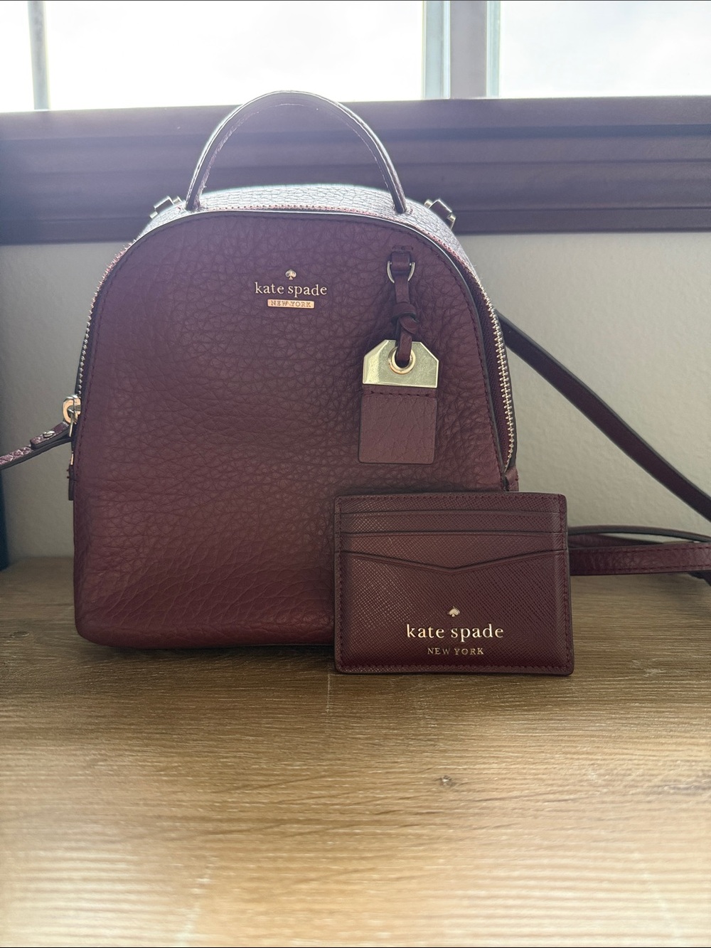 kate spade burgundy leather mini backpack with matching cardholder